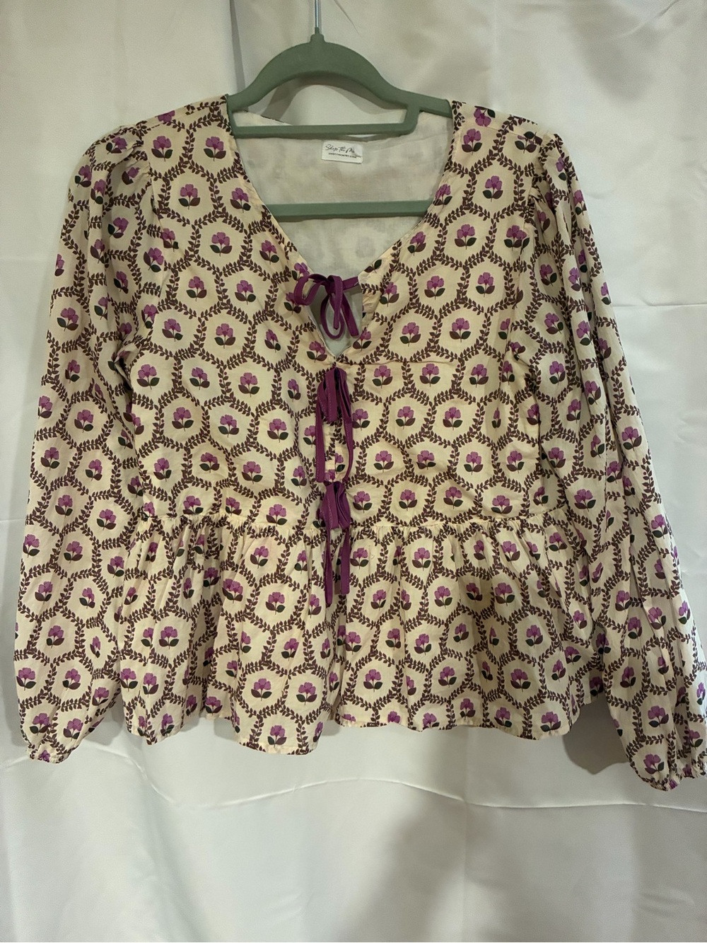 Shop the Mint Bow Detail Floral Peplum Blouse - Cream with Purple Print M